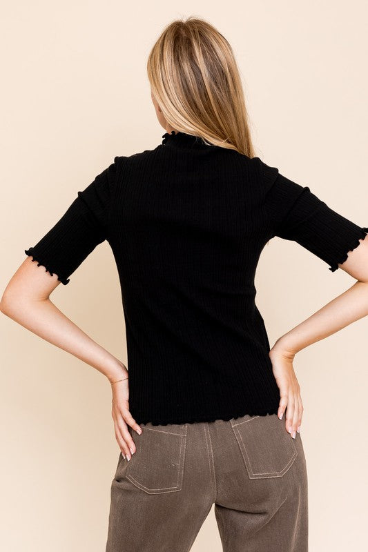 Mock Neck Merrow Edge Top back view in black