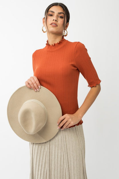 Mock Neck Merrow Edge Top in brick front view