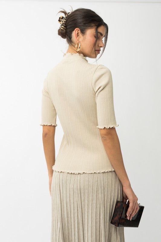 Mock Neck Merrow Edge Top back view in cream