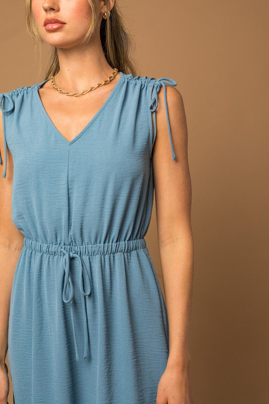 Sleeveless Ruching Waist Dress Blur Close up of tie sleeves